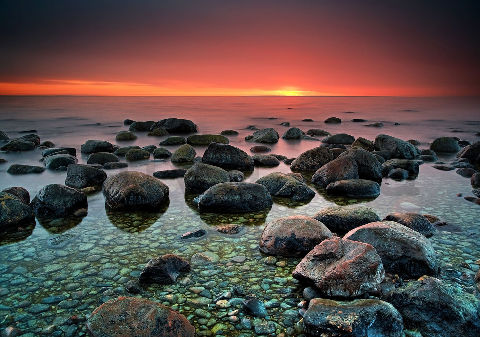 Vlies fotótapéta: Kövek a tengerparton (1) - 104x152,5 cm
